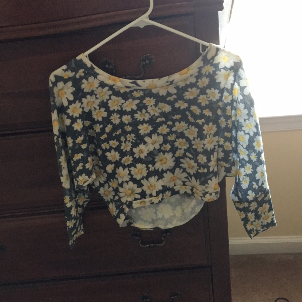 A cropped Delia’s flower top